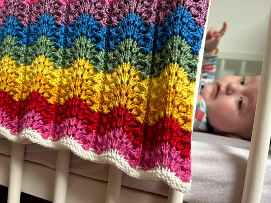 Rainbow Cotton Receiving Blanket in Bright Colour Hanging